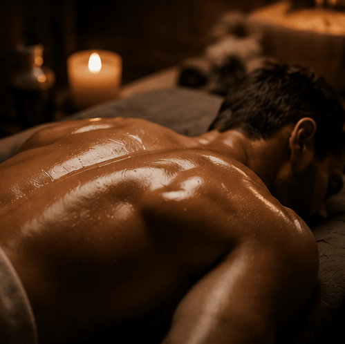 Oiled back in warm candlelight for a body to body massage